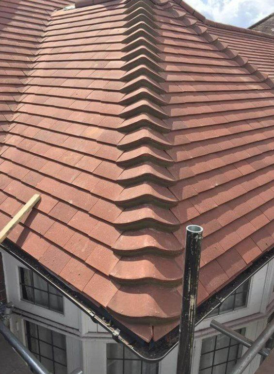 Roofers Leeds - chimney replacement with clay tiles