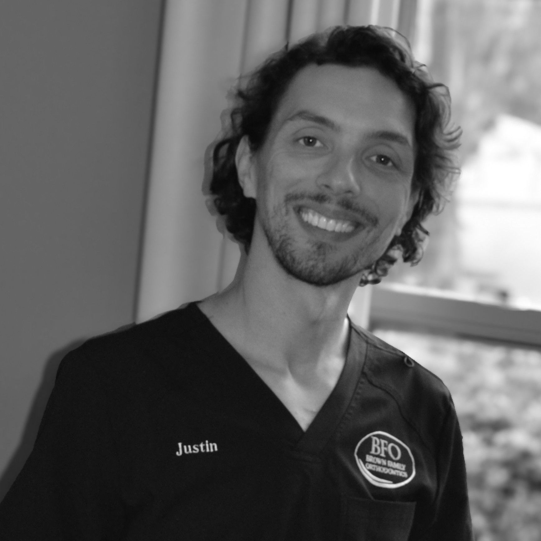 Justin lab technician is smiling for the camera