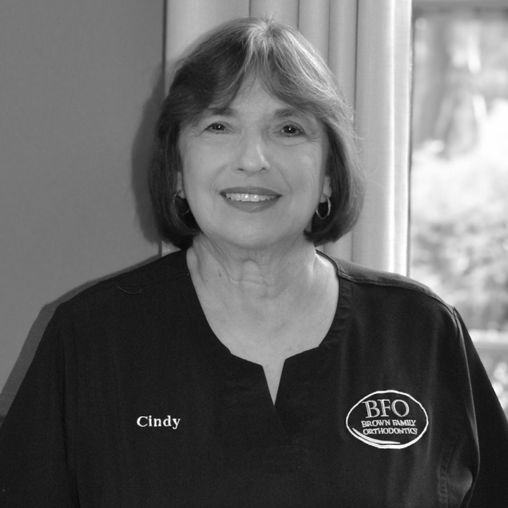 Cindy appointment coordinator is smiling for the camera