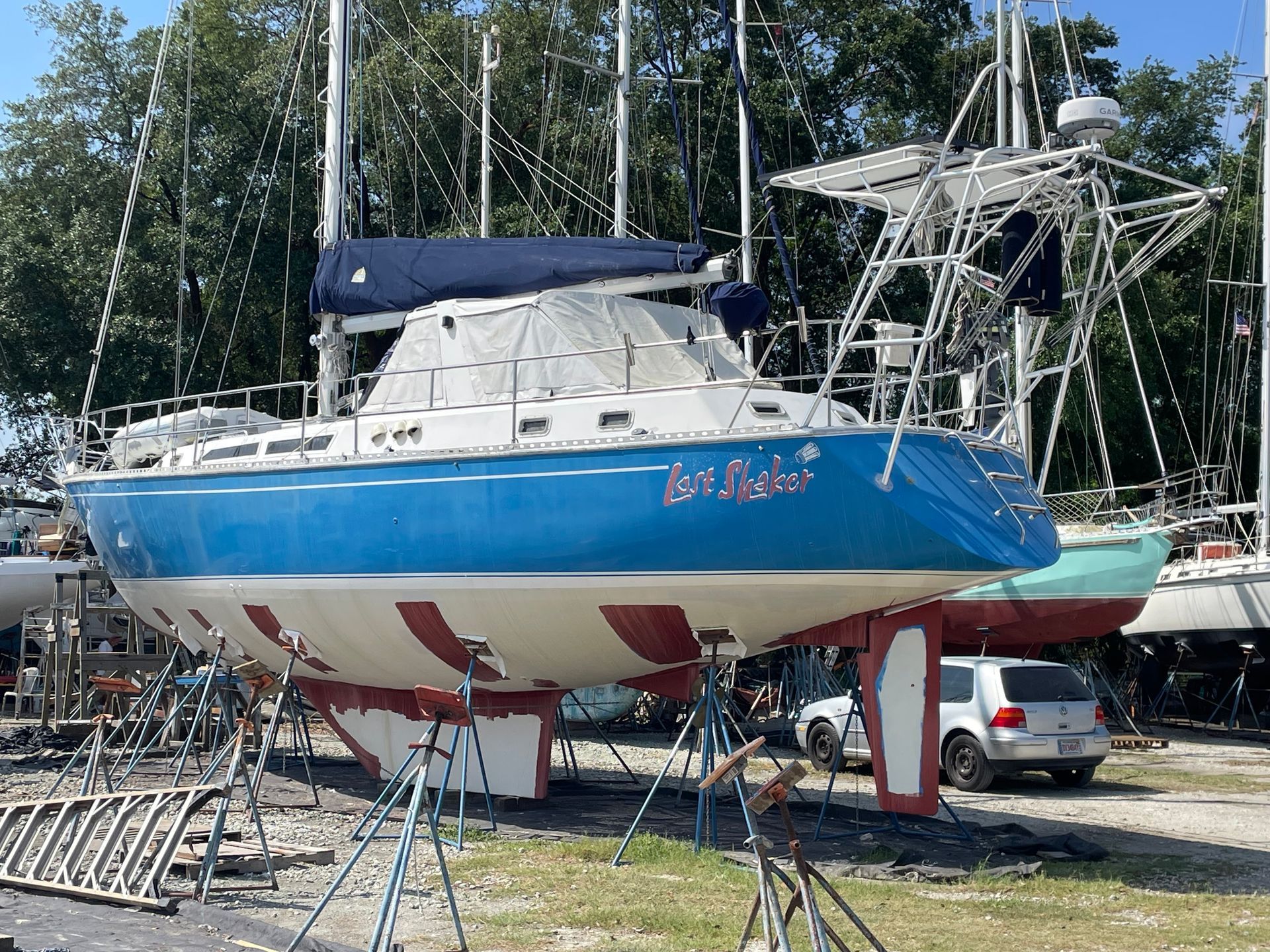 Blue and white sailboat, 