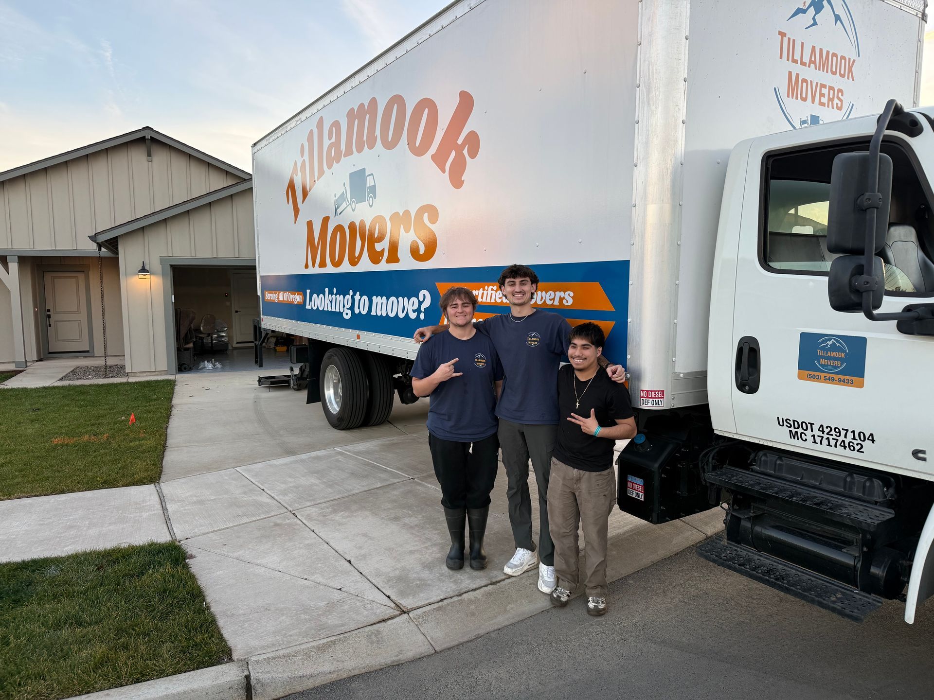 A man is walking down a set of stairs next to a truck.