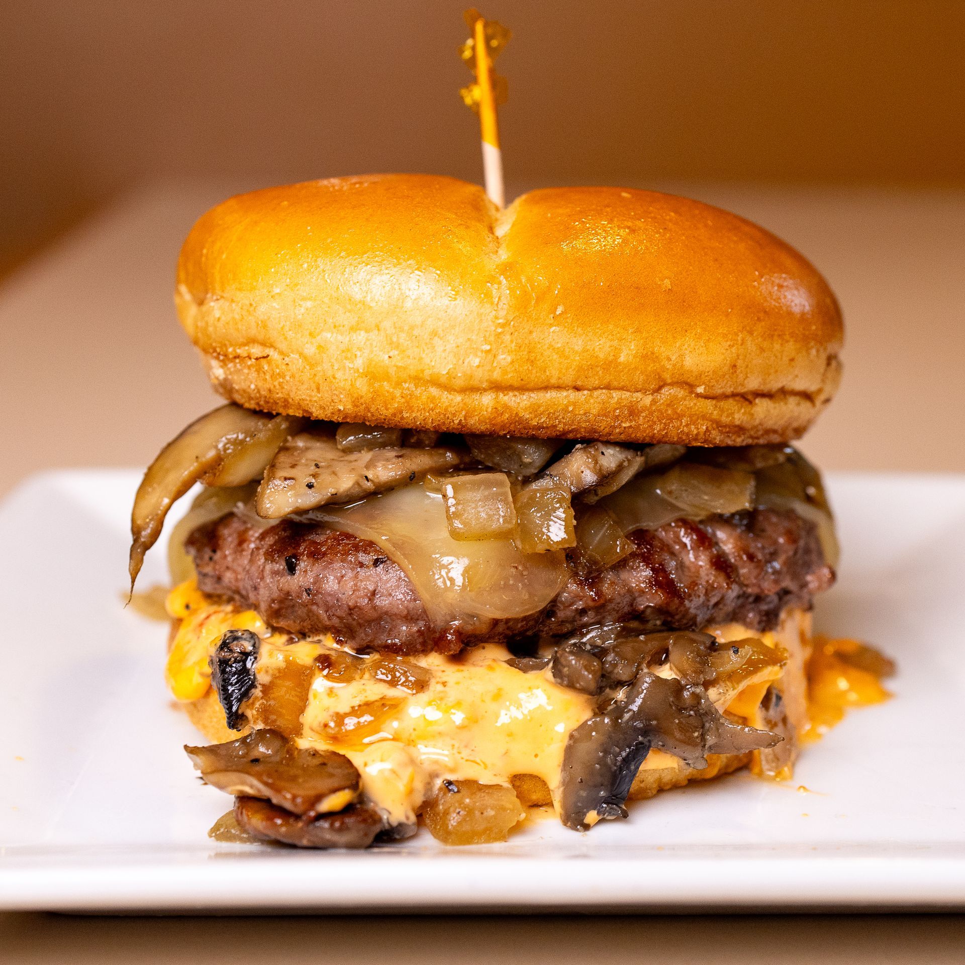 HOMEMADE BANGIN' BREWTERS SAUCE | LETUCE | TOMATO | PICKLE | AMERICAN CHEESE | ONION