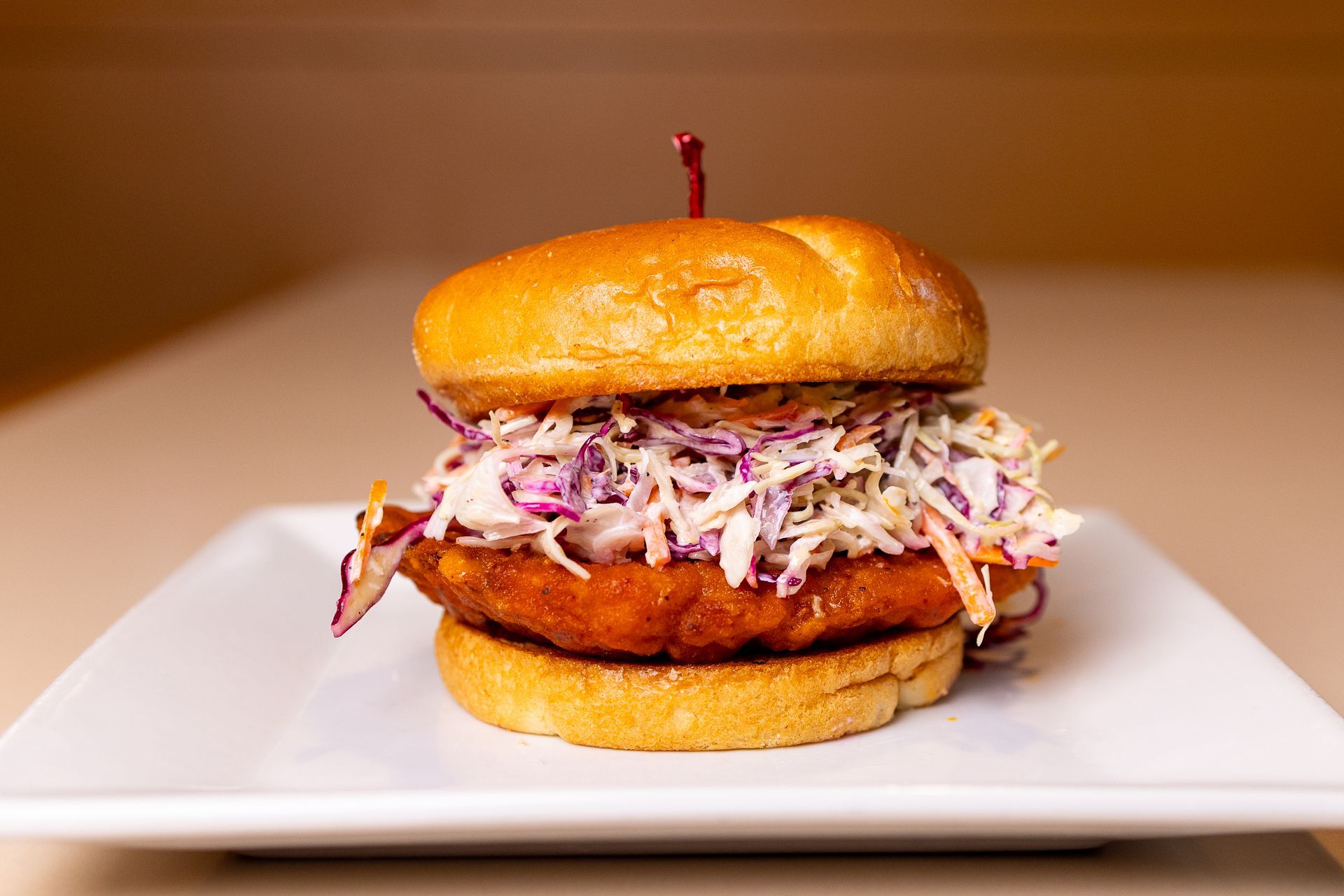 BREADED ZESTY CHICKEN TOSSED IN OUR SIGNATURE BUFFALO SAUCE | FRESH COUNTRY COLE SLAW | HOMEMADE BUFFALO BLUE CHEESE SAUCE