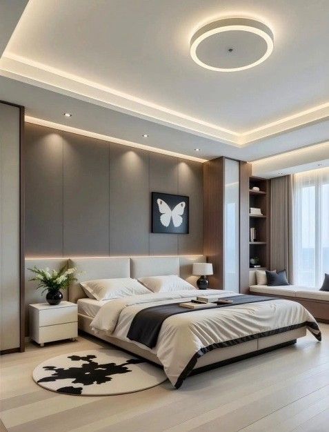 Modern bedroom with neutral tones, large bed, accent wall, and decorative lighting.