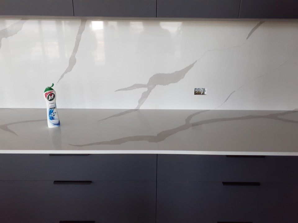 Spray Cleaner on the Kitchen Sink - Custom Granite In Darwin