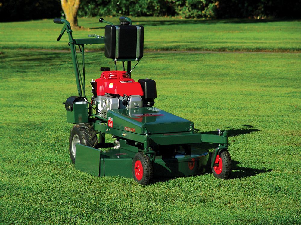 Lawn mowing machine in the lawn