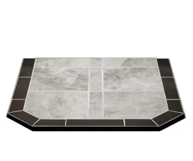Light gray tiled hearth with dark border trim and beveled front edge