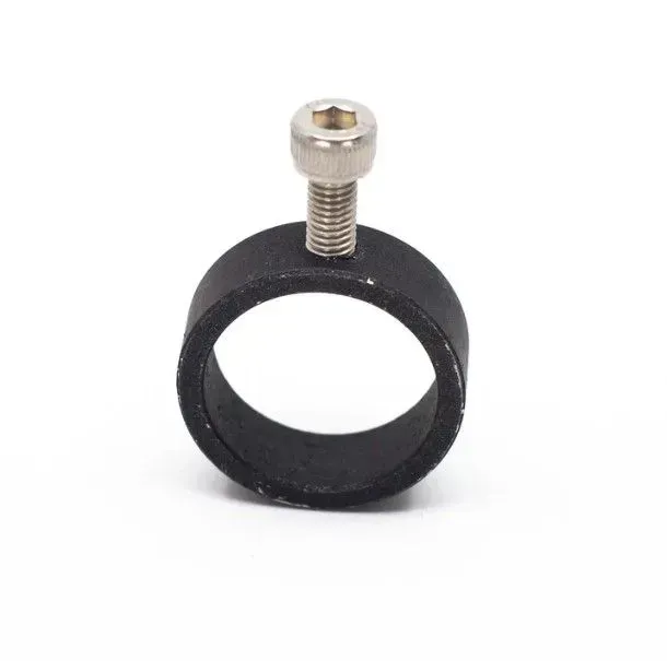 Black circular clamp ring with a silver screw on a white background