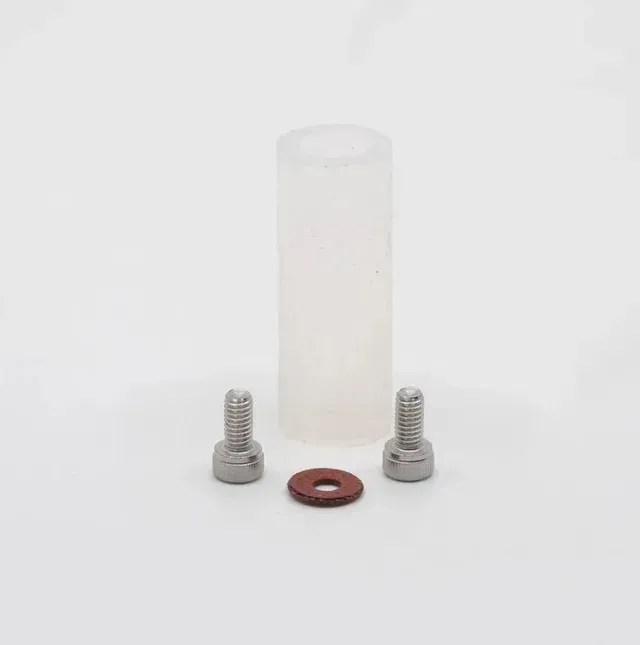 Small hardware kit: clear plastic tube, two silver bolts, and a red washer on a white background