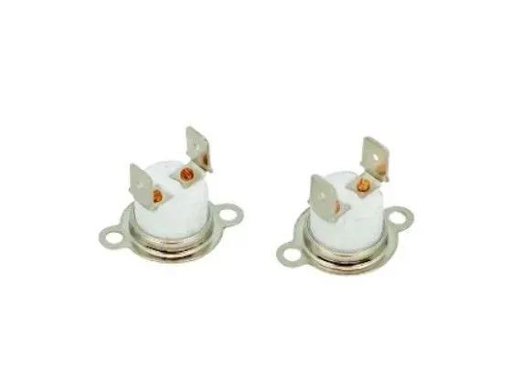 Two white porcelain electrical connectors with metal terminals on a white background