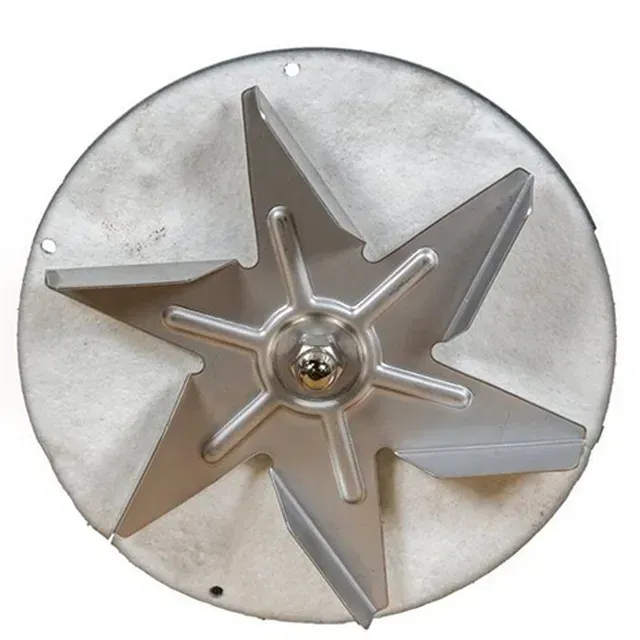 Silver star-shaped metal wheel hub on a circular plate, viewed from above.