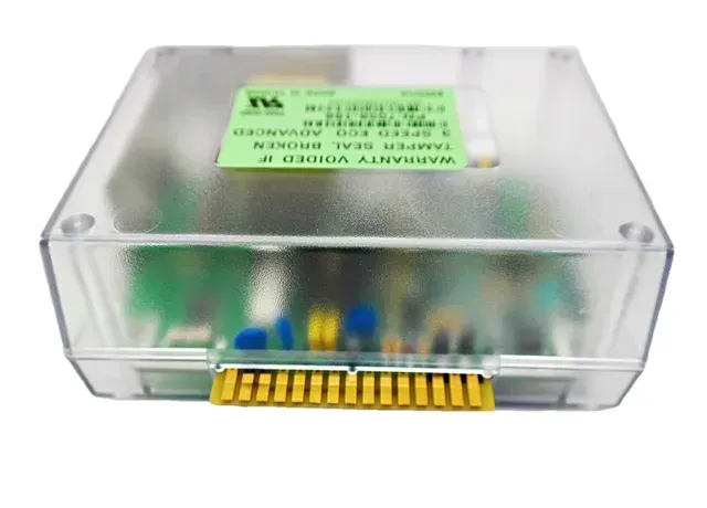 Clear plastic electronic module with a green label and gold connector pins on the front