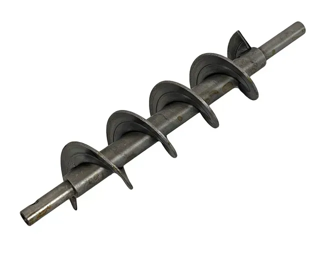 Metal auger drill bit with spiral blades on a white background
