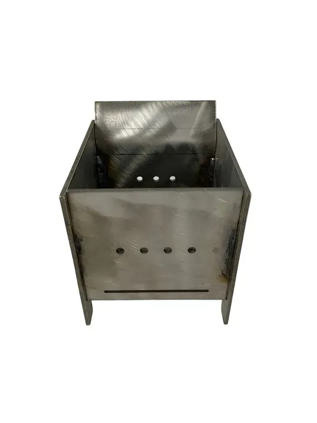 Metal charcoal grill or firebox with perforated front panel and open top, isolated on white background