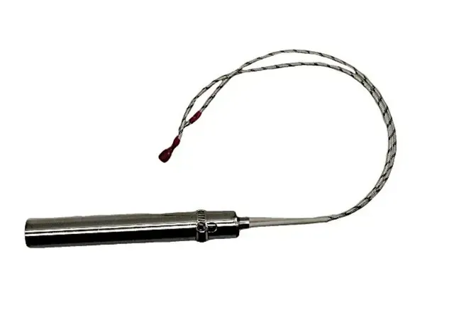 Stainless steel heated probe with coiled cable on a white background