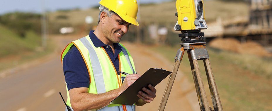 worker male smiling | land surveying | Garfield NJ