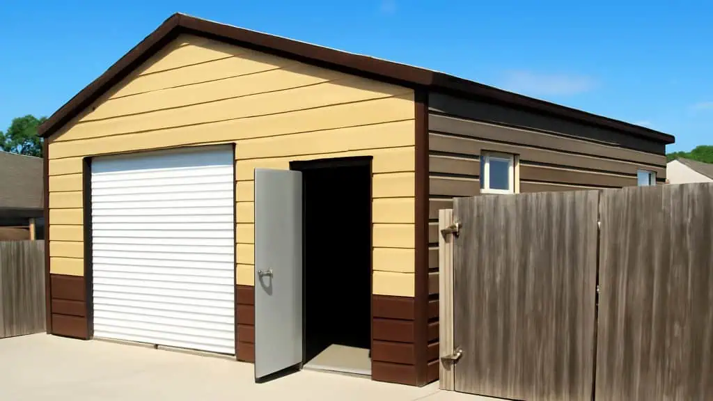 Tan and brown metal garage with an open door and fence.