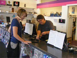 Woman Buying at Computer Store — Covington, GA — PC AfterDark