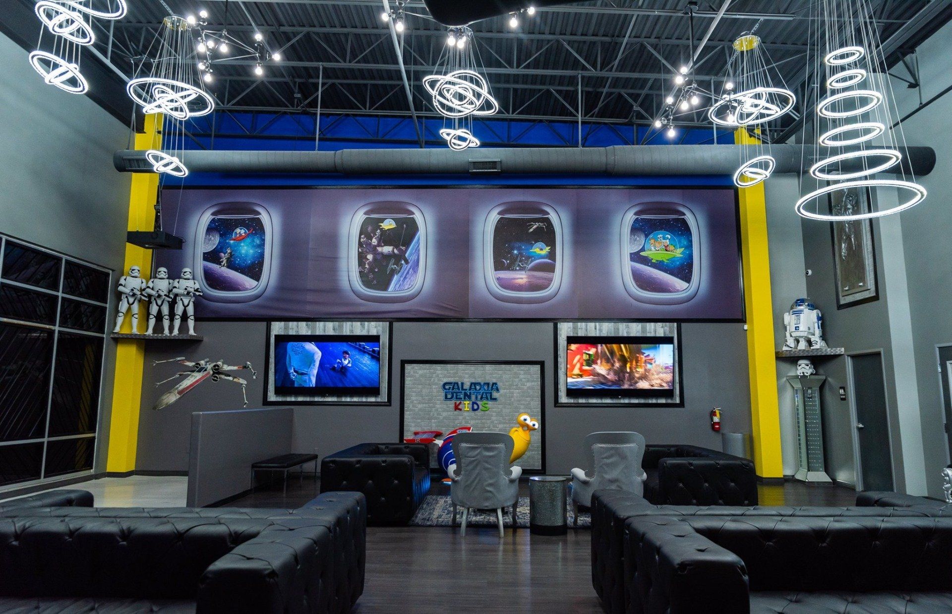 A large room with a large airplane mural on the wall.