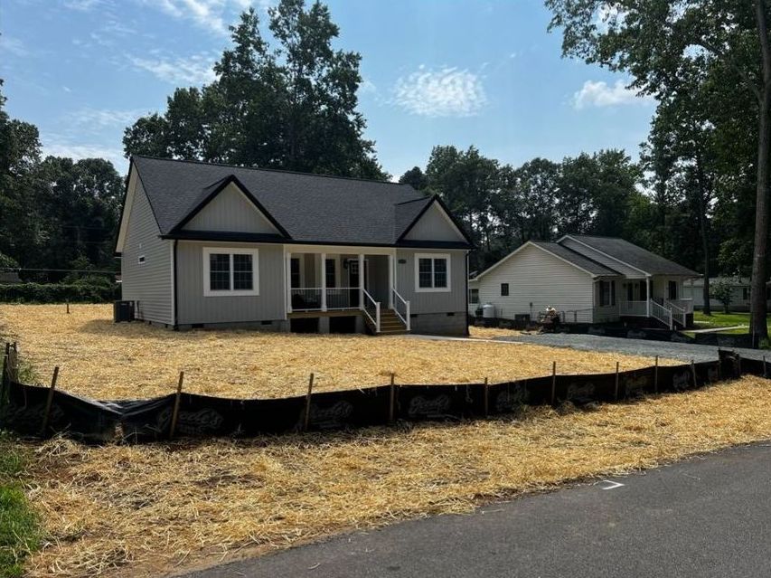 A house with a lot of grass in front of it