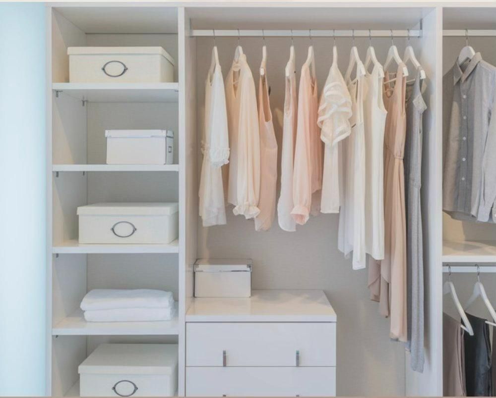 A closet filled with lots of clothes and boxes. — The Home Assembly In Avoca Beach, NSW