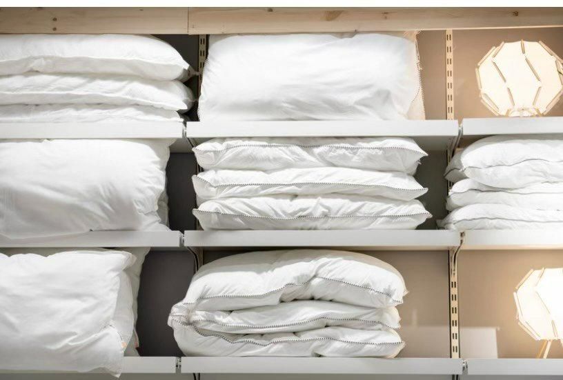 A shelf filled with lots of white pillows and blankets. — The Home Assembly In Avoca Beach, NSW