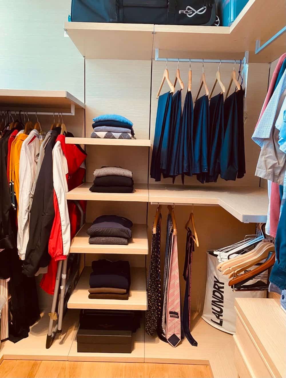 a Closet Filled With Clothes and a Laundry Bag — The Home Assembly In Avoca Beach, NSW