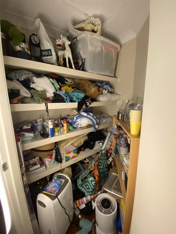 a Closet Filled With Lots of Items and a Yoga Mat — The Home Assembly In Avoca Beach, NSW