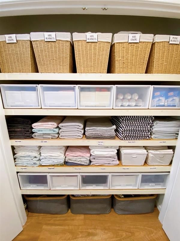 a Closet Filled With Clothes and a Laundry Bag — The Home Assembly In Avoca Beach, NSW