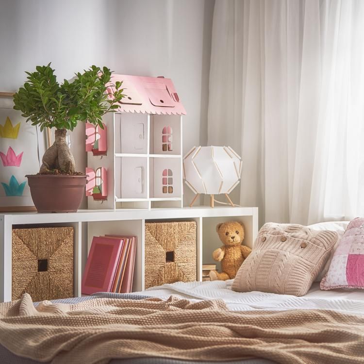 A bedroom with a doll house and a teddy bear on the bed — The Home Assembly In Avoca Beach, NSW