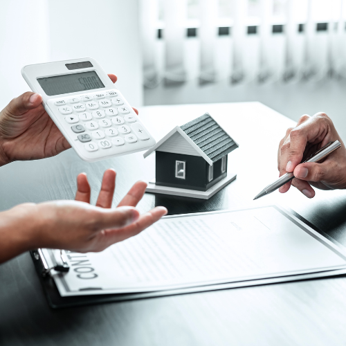 Hands calculating mortgage with calculator, house model, and person signing contract.