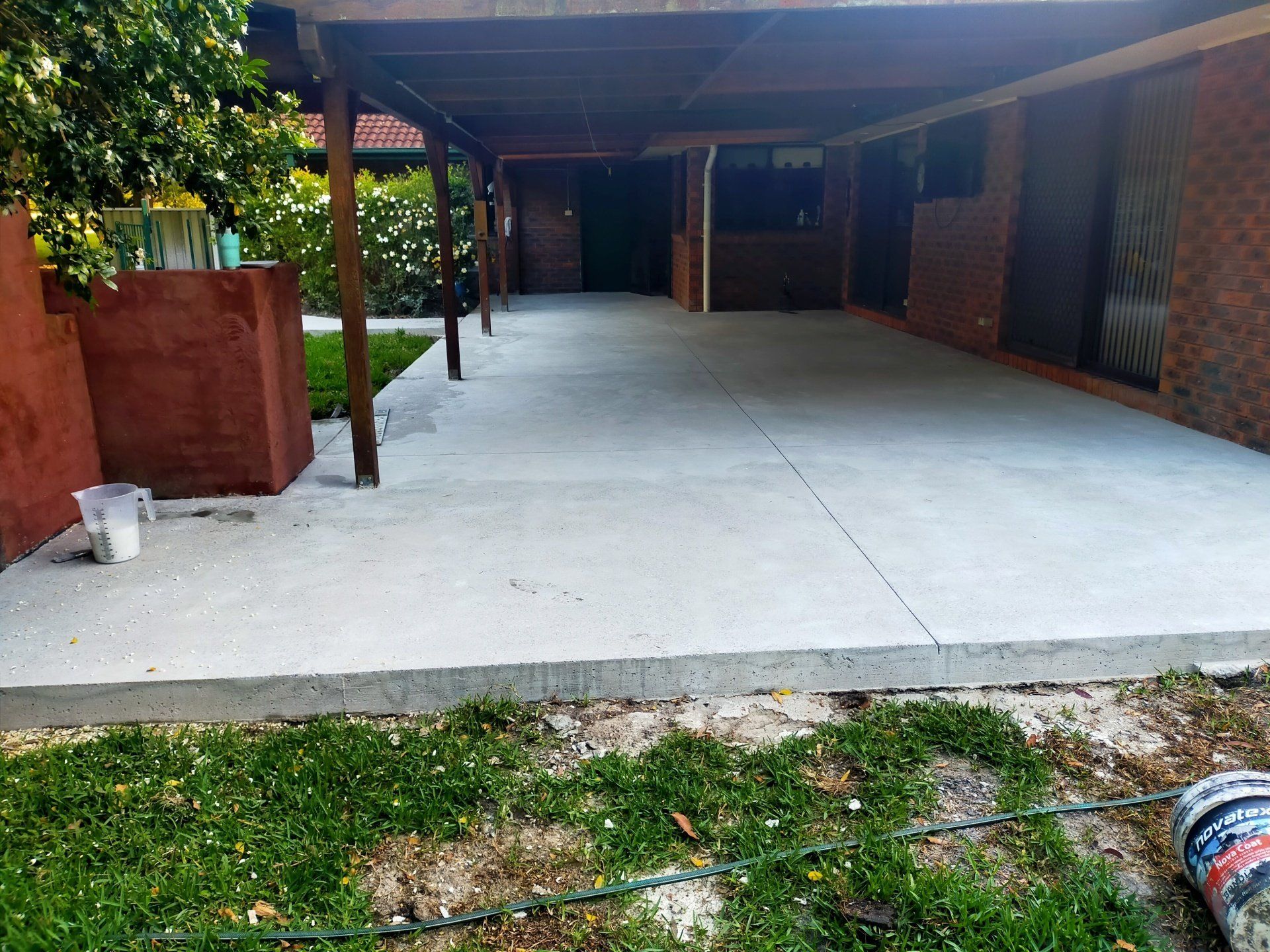Workers Concreting a residential patio — About Us in Port Stephens, NSW