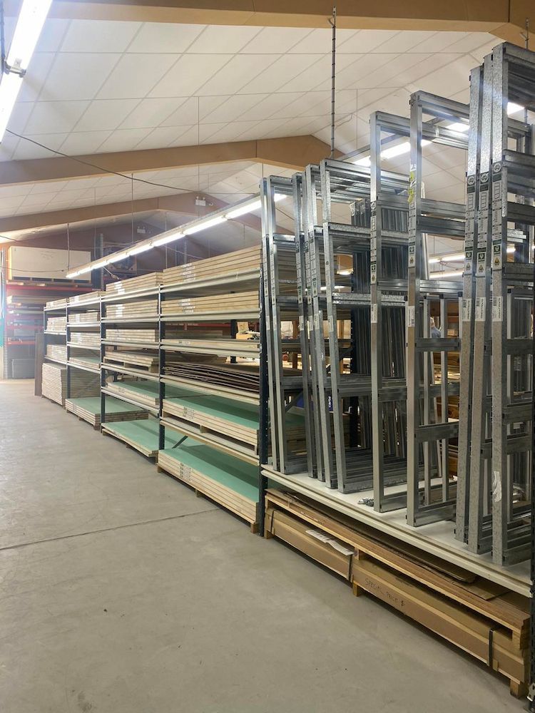 A Warehouse Filled With Lots Of Shelves And Boxes — Elliott Timber Sales Pty Ltd in Ryan, QLD