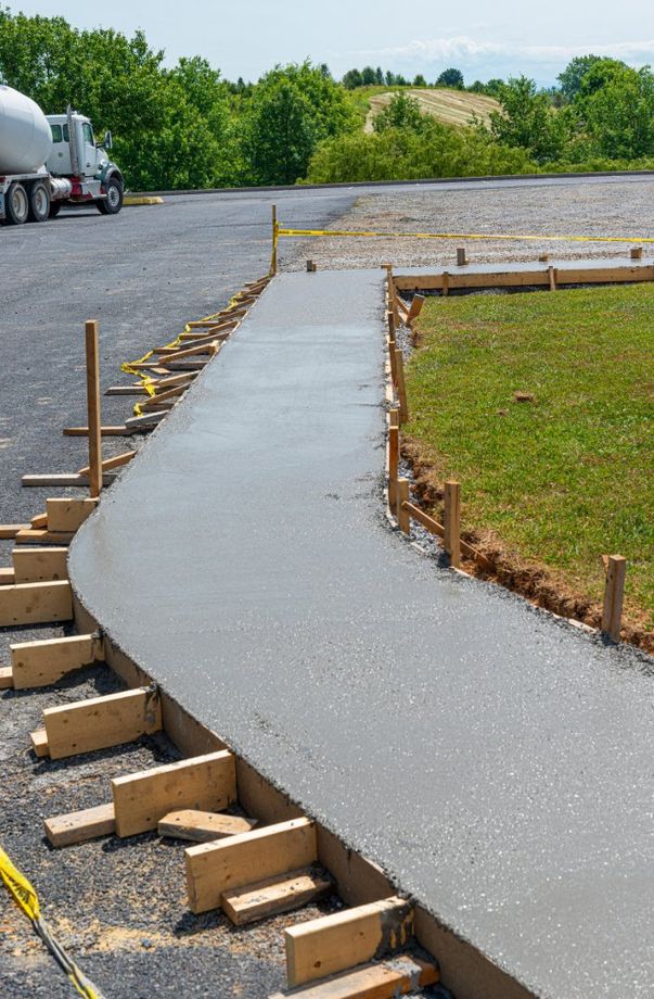 A concrete walkway and sidewalk being installed by Peterborough Custom Concrete.
