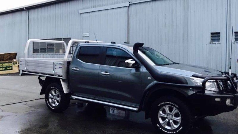 Black Car with Trays — Trailers, Trays and Tippers Parts in South Lismore, NSW