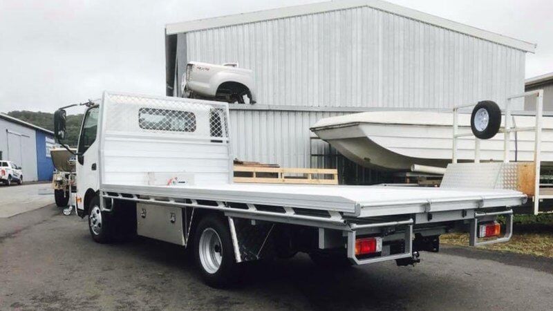 White Car with Trays — Trailers, Trays and Tippers Parts in South Lismore, NSW