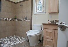 Bathroom With Natural Stone — Hyannis, MA — Cloutier Supply Company
