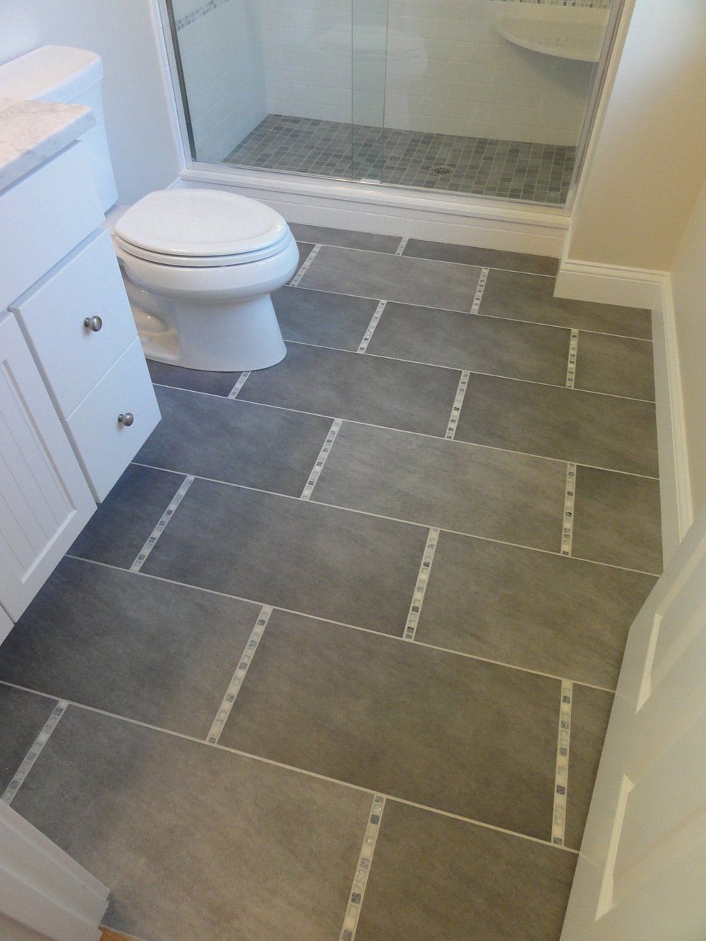 Bathroom With Tiles Flooring — Hyannis, MA — Cloutier Supply Company