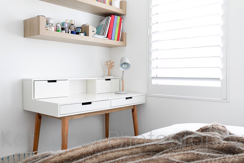 There is a Desk in the Corner of the Room Next to the Bed — Dowdy Constructions in Forster, NSW