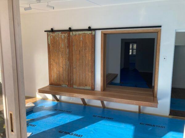 A Room With a Sliding Barn Door and a Window — Dowdy Constructions in Forster, NSW