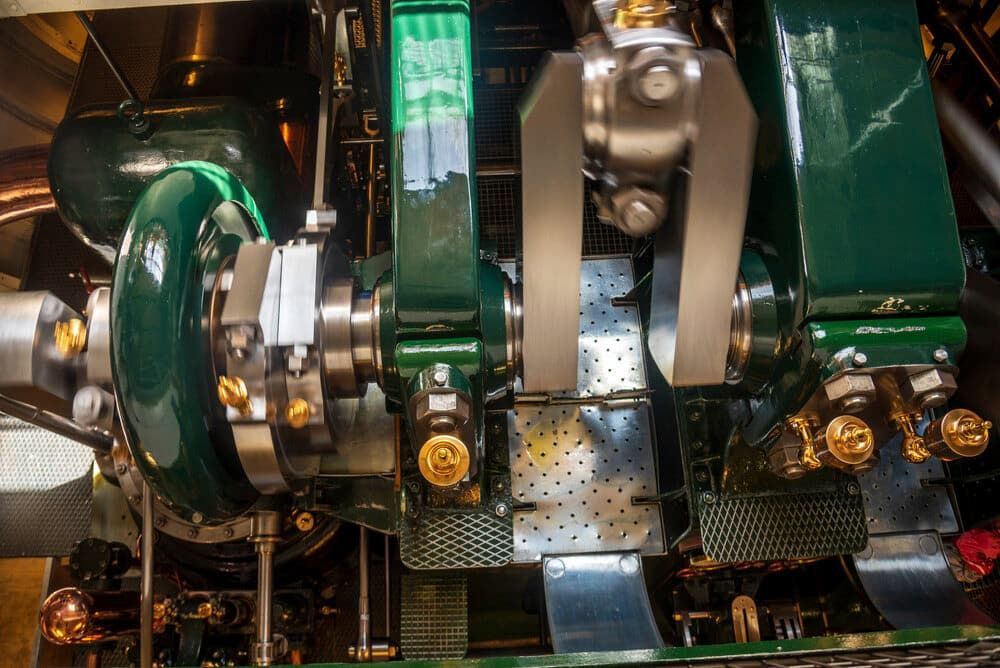 A Close Up of a Green and Silver Engine on a Boat — Whitsunday Diesel & Marine In Ayr, QLD