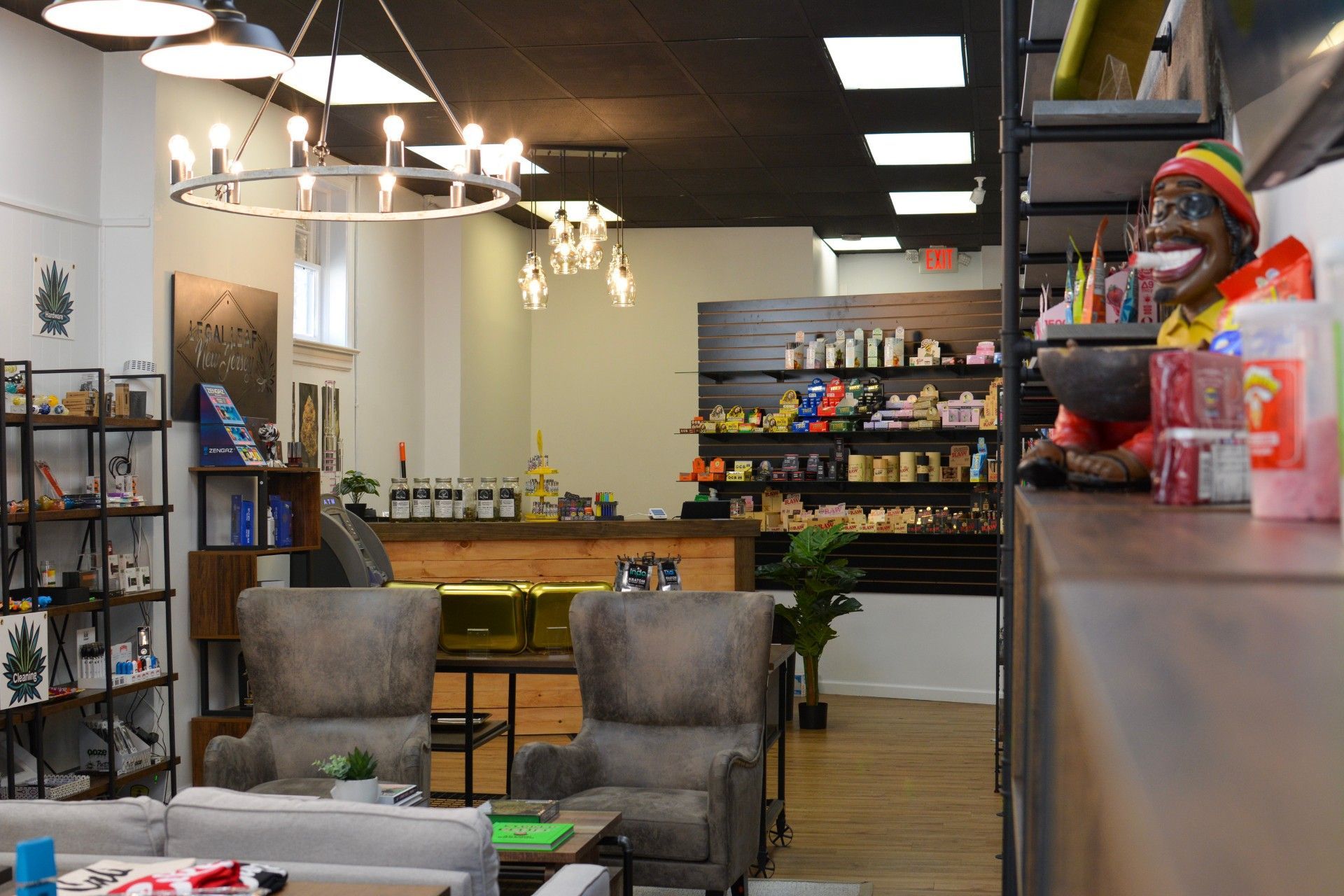 A room filled with furniture and a chandelier in a store.