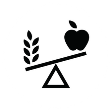 An apple and a wheat are on a seesaw.