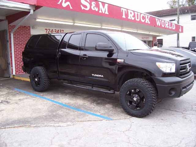 Black Truck Side View — Truck Accessories in Clearwater, FL
