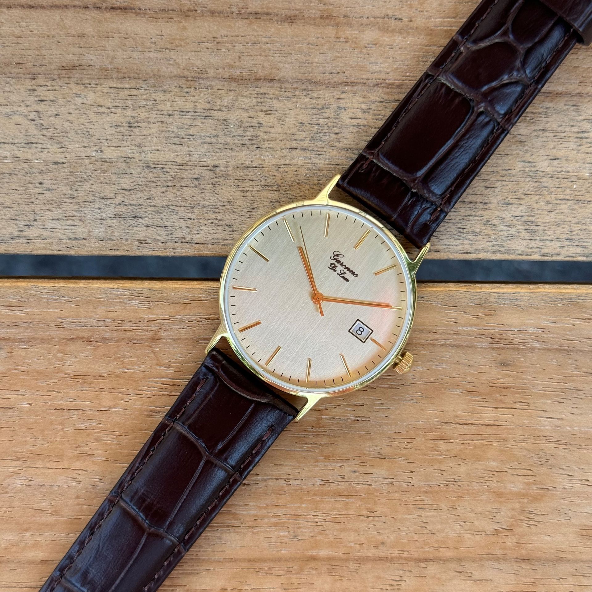 een garonne 14 karaat gouden heren horloge met leren band. uitermate geschikt als relatie geschenken voor een jubileum