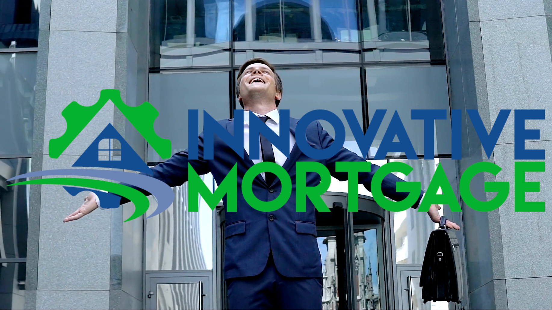 A man in a suit and tie is standing in front of a building that says innovative mortgage