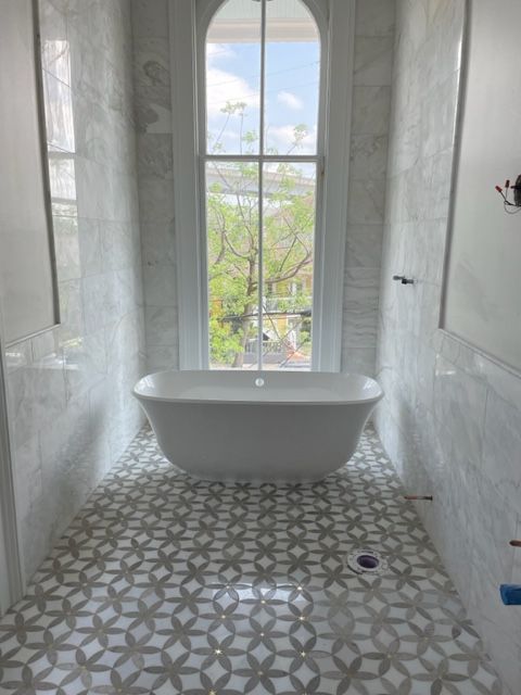 Residential plumbing job provided by Plumb & Square in New Orleans, bath tub installation