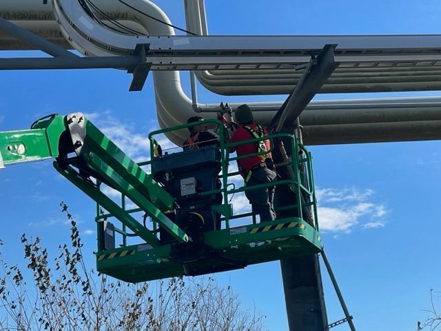 Photo of Rigo working on a plumbing repair in New Orleans