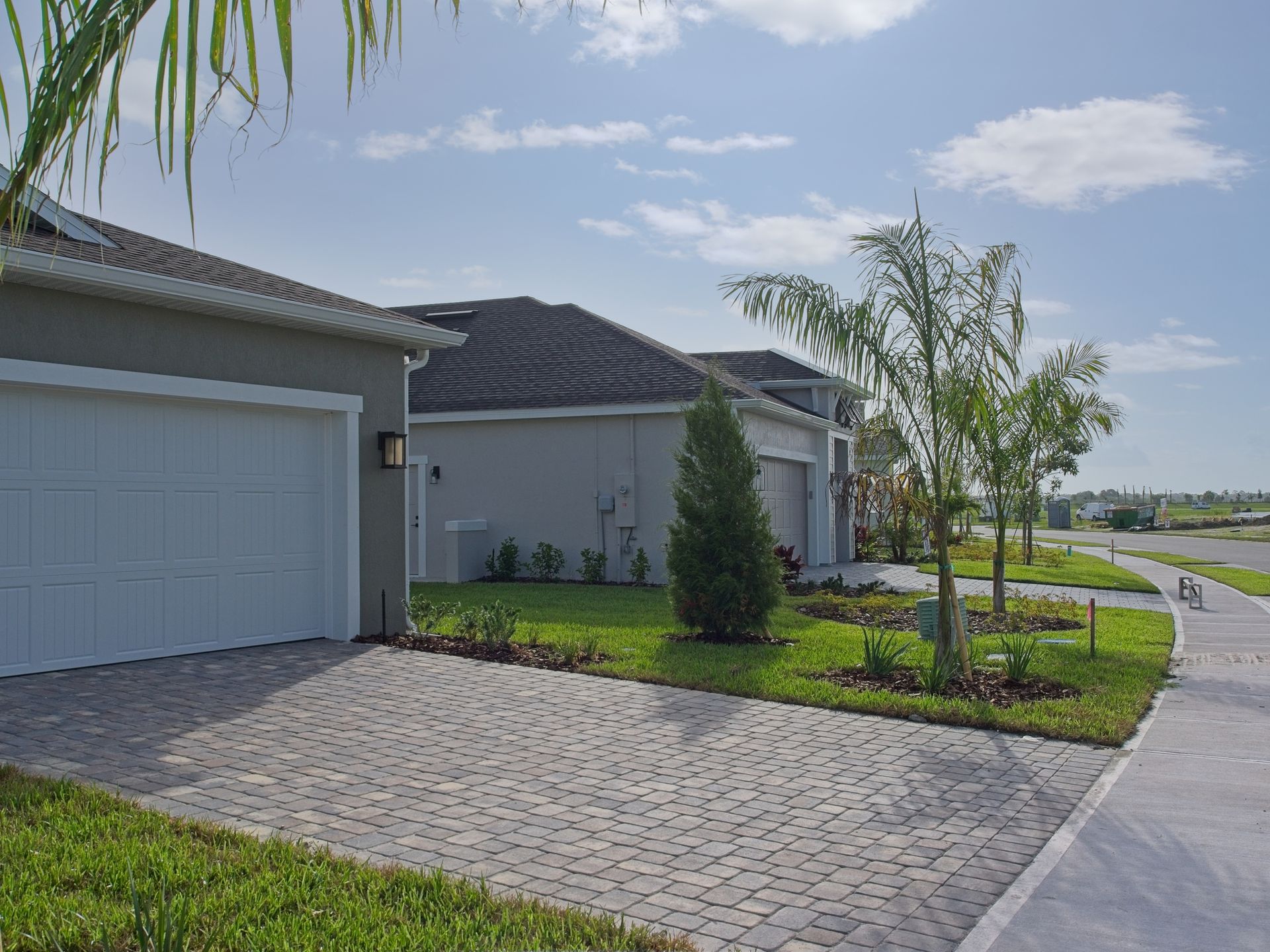 A completed example of paver driveways in a neighborhood setting, built for durability and style.