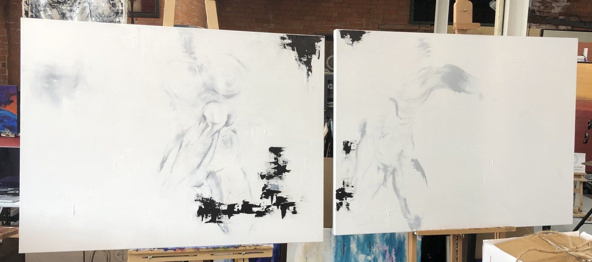Large black and white diptych, male and female figures by karen klucowicz